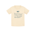 Camiseta de bebé para regalo original en Burgos (Castilla y León) color beige con la frase Tierra sagrada donde yo nací de la marca Zander.